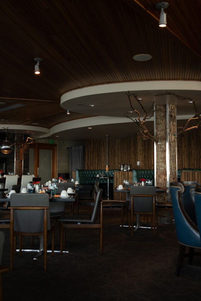 Restaurant interior with wooden ceiling and ambient lighting